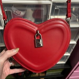 Red heart shaped crossbody bag with removable strap and locket 🔒❤️
